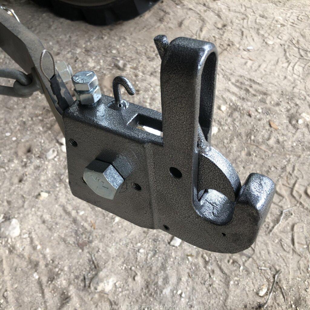 Fast hitch fastened to lift arm
