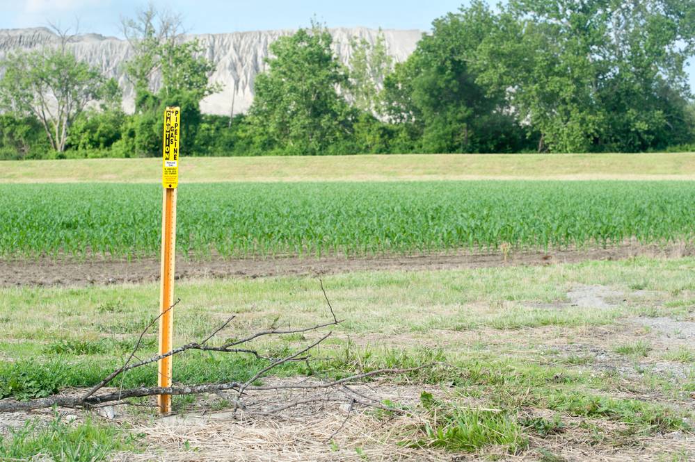 Gas Pipeline Corn field Field with pipeline marker in view